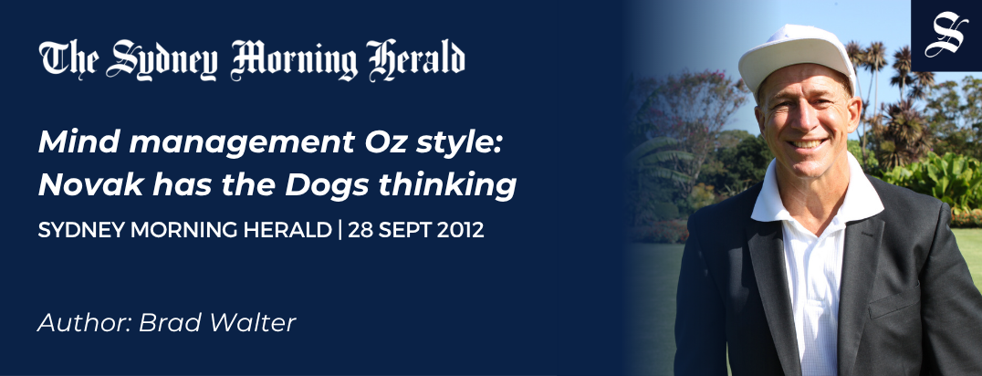 John Novak smiling outdoors in white cap and blazer — Sydney Morning Herald article, September 2012